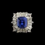 A NATURAL UNHEATED SAPPHIRE AND DIAMOND CLUSTER RING
