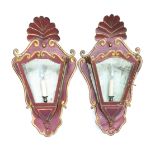 A PAIR OF PARCEL-GILT RED DECORATED TOLE-PEINTE WALL LANTERNS (2)