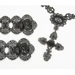 A PAIR OF GERMAN IRONWORK BRACELETS AND A NECKLACE (3)