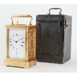 A RARE AND UNUSUAL FRENCH ENGRAVED GILT-BRASS BELL STRIKING CARRIAGE CLOCK WITH PUSH REPEAT ON...