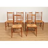 A SET OF SIX 19TH CENTURY STAINED BEECH SPINDLE BACK DINING CHAIRS (6)