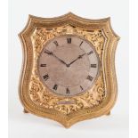 A GOOD VICTORIAN GILT-BRASS AND ENGRAVED SHIELD-SHAPED STRUT TIMEPIECE
