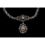 A 19TH CENTURY SILVER AND COLOURELSS PASTE PENDANT NECKLACE