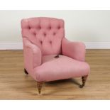 HOWARD AND SONS; A WALNUT FRAMED BUTTON-BACK EASY ARMCHAIR ON TURNED SUPPORTS