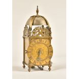 A BRASS STRIKING LANTERN CLOCK