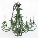 A WROUGHT-IRON GREEN PAINTED EIGHT LIGHT CHANDELIER