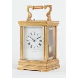 A FRENCH BRASS CARRIAGE CLOCK WITH PUSH REPEAT