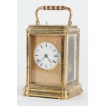 A FRENCH ENGRAVED GORGE CASED CARRIAGE CLOCK WITH PUSH REPEAT