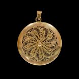 A GOLD OPENWORK DISK PENDANT