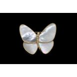 A VAN CLEEF AND ARPLES MOTHER OF PEARL AND DIAMOND BROOCH