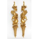 A PAIR OF CARVED GILTWOOD WALL APPLIQUÉS (2)