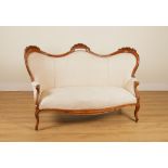 A VICTORIAN MAHOGANY FRAMED DOUBLE HUMP BACK SOFA