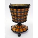 A DUTCH COOPERED WALNUT, HOLLY AND EBONISED TEESTOOF OR KETTLE BUCKET