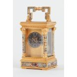 A FRENCH GILT-BRASS AND CHAMPLEVE ENAMEL MINIATURE CARRIAGE TIMEPIECE