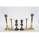 A TWO PAIRS OF BRASS CANDLESTICKS (6)