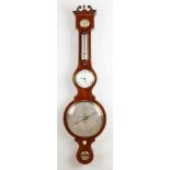 A RARE REGENCY WHEEL BAROMETER WITH TIMEPIECE