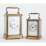 A FRENCH BRASS CARRIAGE CLOCK AND A CARRIAGE TIMEPIECE (2)