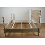 RALPH LAUREN; A CREAM PAINTED SUPER-KING SIZE BED WITH SPHERE FINIALS