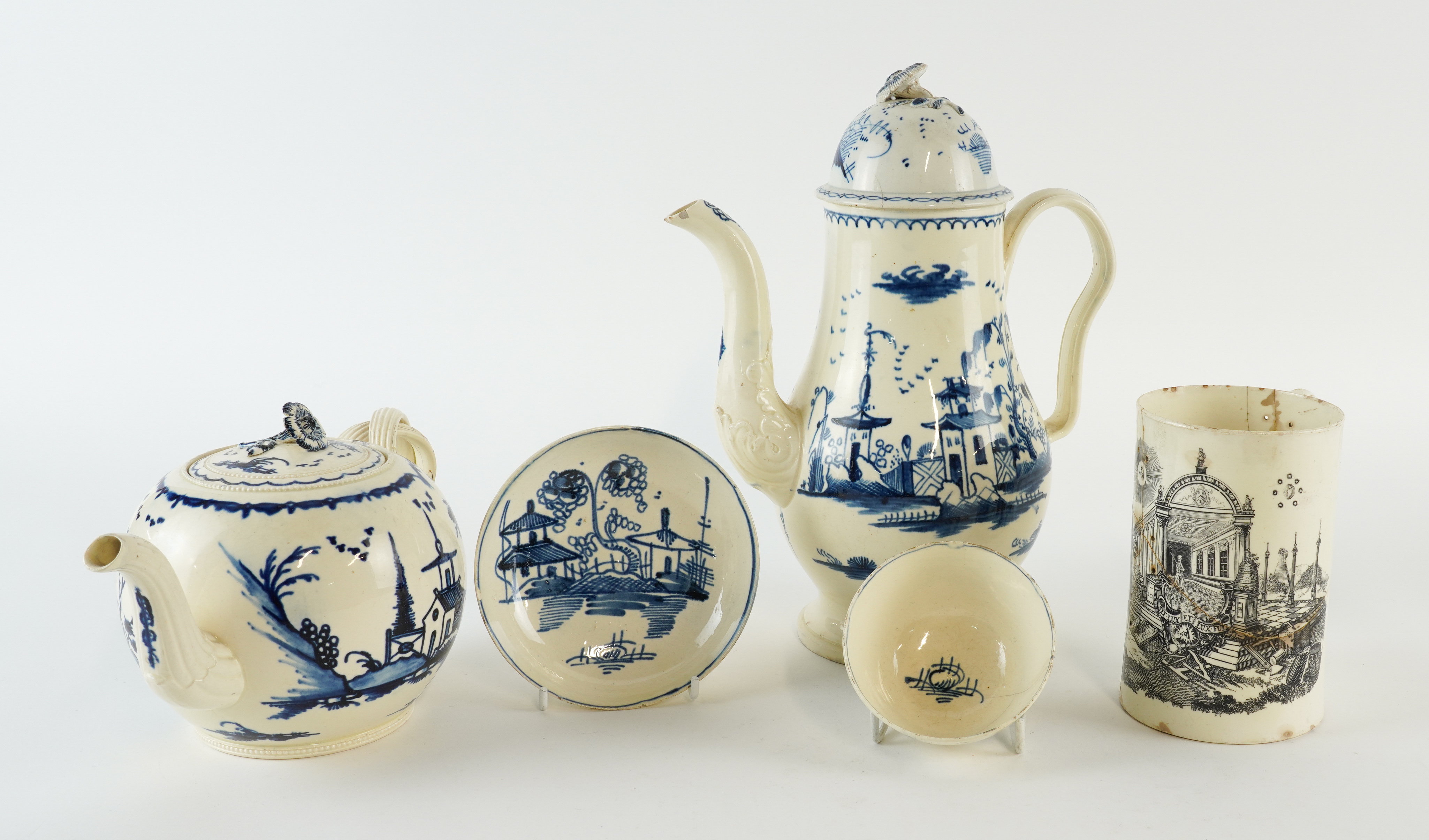 A GROUP OF ENGLISH BLUE AND WHITE CREAMWARE