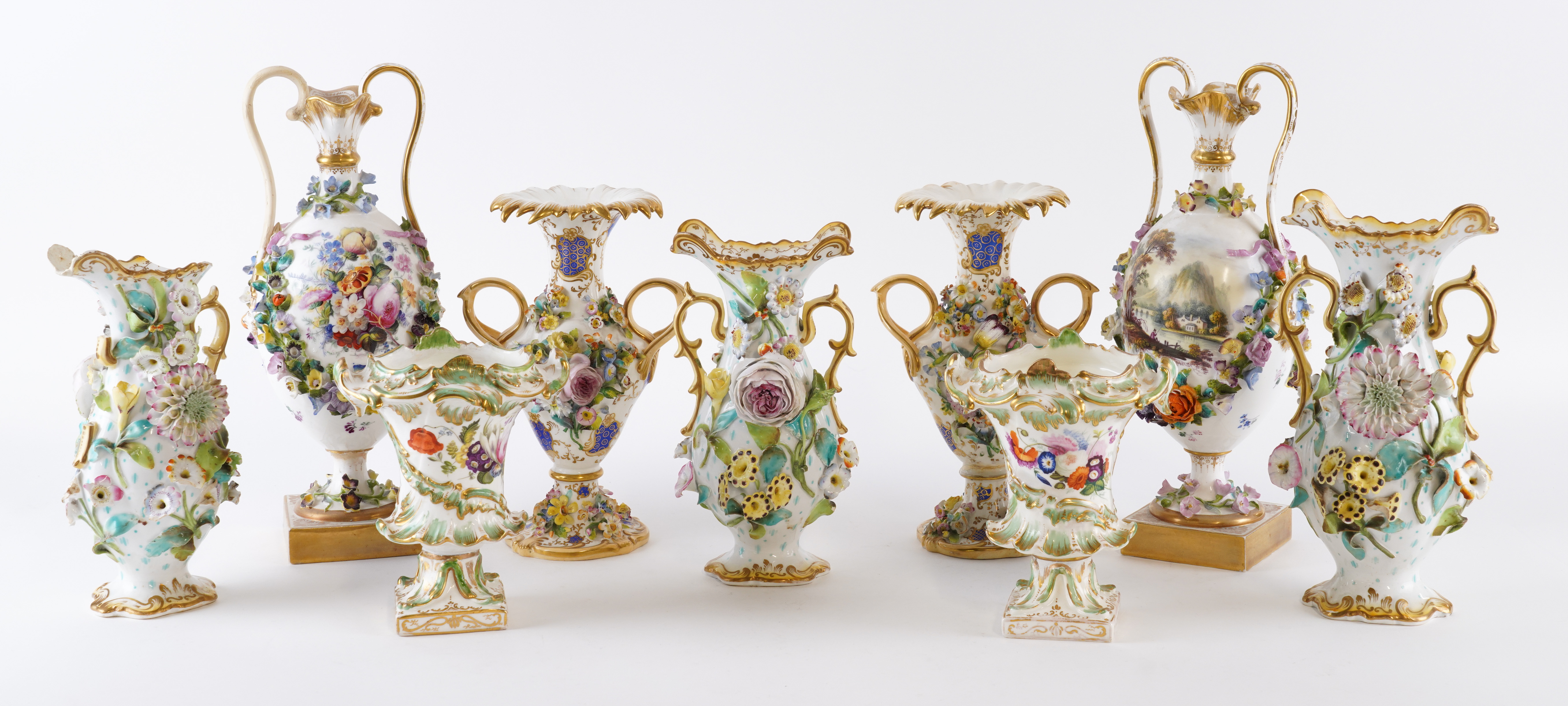 A GROUP OF NINE ENGLISH PORCELAIN VASES (9)