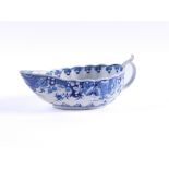 A WORCESTER BLUE AND WHITE OVAL FLUTED SAUCEBOAT