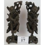 A pair of well carved Chinese rootwood figures both with glass eyes and some damage. (pr). Condition