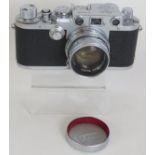 A Leica DRP model IIIF camera No 582506 circa 1951/52 with Summicrom 5cm F2 lens. Condition