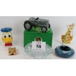 A border fine arts James Herriot tractor money box, a vintage Donald Duck money box, three