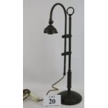 A period rise and fall brass desk lamp, well patinated. Height 57cm-68cm. Condition report: