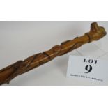 A beautifully carved Folk Art walking cane, probably blackthorn or holly, deeply carved with snakes,