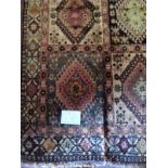 A very decorative Qashqai Persian rug, good colour and condition. 165cm x 100cm.