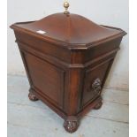 An Edwardian Regency revival mahogany cellarette of sarcophagus form, with brass finial handle &