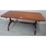 A good quality reproduction mahogany coffee table by Arthur Brett & Sons of Norwich, the crossbanded