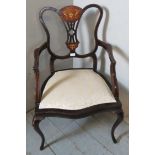 An Edwardian mahogany Sheraton revival inlaid elbow chair, strung with satinwood & featuring a