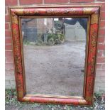 A decorative wall mirror with hand painted frame in the Chinoiserie taste and nicely silvered mirror