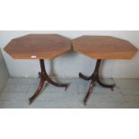 A pair of mahogany octagonal side tables in the Regency taste, raised on fluted pedestals,
