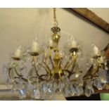 A good quality crystal and gilt brass 12 branch chandelier with 18 bulb holders. Chandelier height