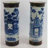 A pair of hand decorated antique Chinese porcelain sleeve vases with crackle glaze finish. Height