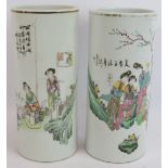 A pair of antique Chinese porcelain sleeve vases hand decorated with family scenes. Height 28cm.