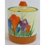 A Clarice Cliff Bizarre crocus pattern preserve pot and lid. Height 9cm. Condition report: Slight