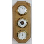 A contemporary Robert Thompson's Mouseman barometer incorporating barometer, thermometer and