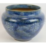 An early 20th Century Royal Doulton Stoneware Jardinière with blue drip glaze and applied floral