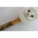 A superbly carved barn owl head countryman's stick, the head being carved and hand painted and