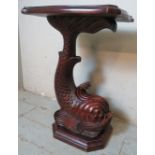 A Victorian mahogany lamp table, the hardwood base ornately carved in the form of a koi carp in the