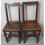 A pair of early 18th Century Lorraine chairs, on turned and block supports united by turned