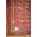 A 19th Century Belouch (Persian) rug on claret ground. 120 x 168 Condition report: Some light wear.