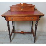 An Edwardian rosewood ladies? writing desk, strung with satinwood and featuring batwing inlay,