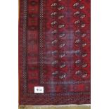 A late 19th/early 20th Century Belouch Persian rug, on burgundy ground. 185 x 140. Condition report: