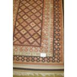 A mid 20th Century Kelim rug on pink ground. 160 x 252 approx. Condition report: Some fading and a