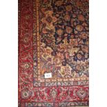 A fantastic (signed) Birjand carpet with a central eight point flower motif and depicting birds. 3.